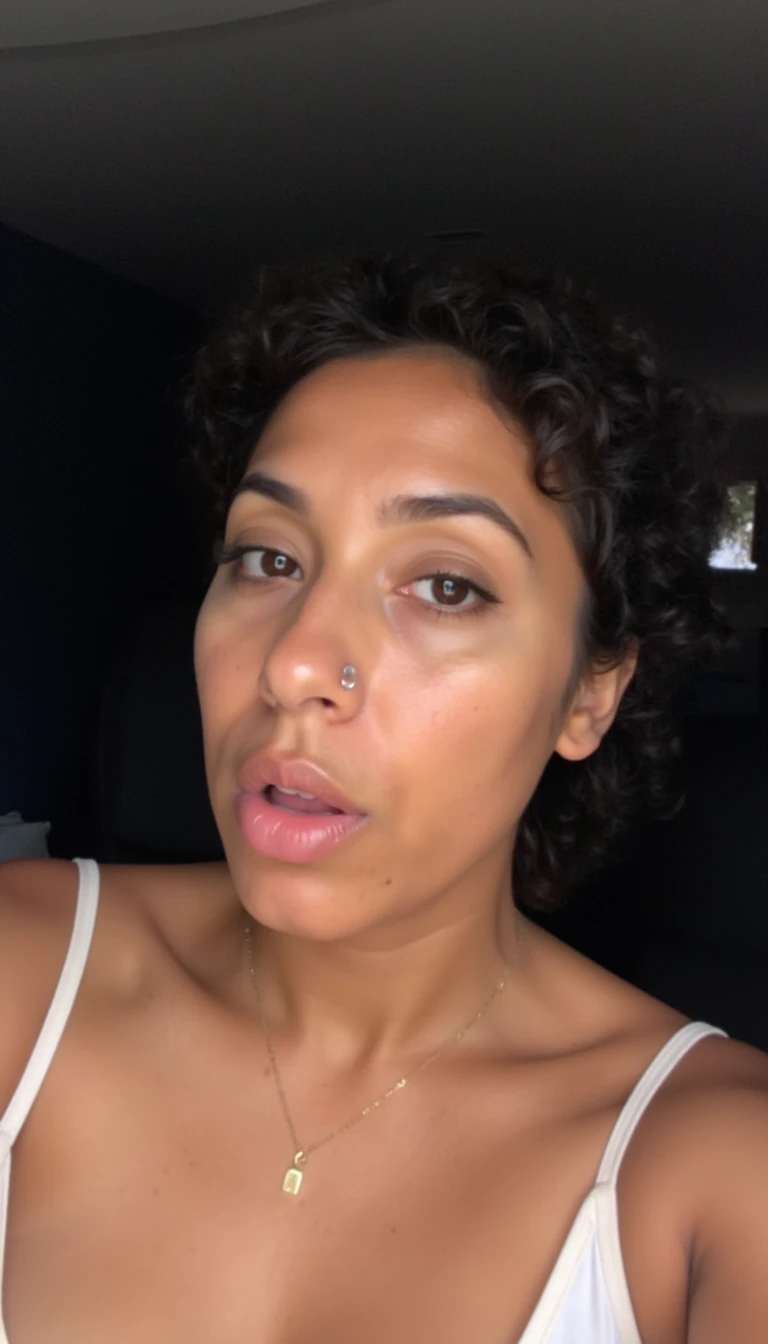 boring low quality snapchat photo circa 2015, cute mexican woman, soft light black curly hair, with big lips selfie