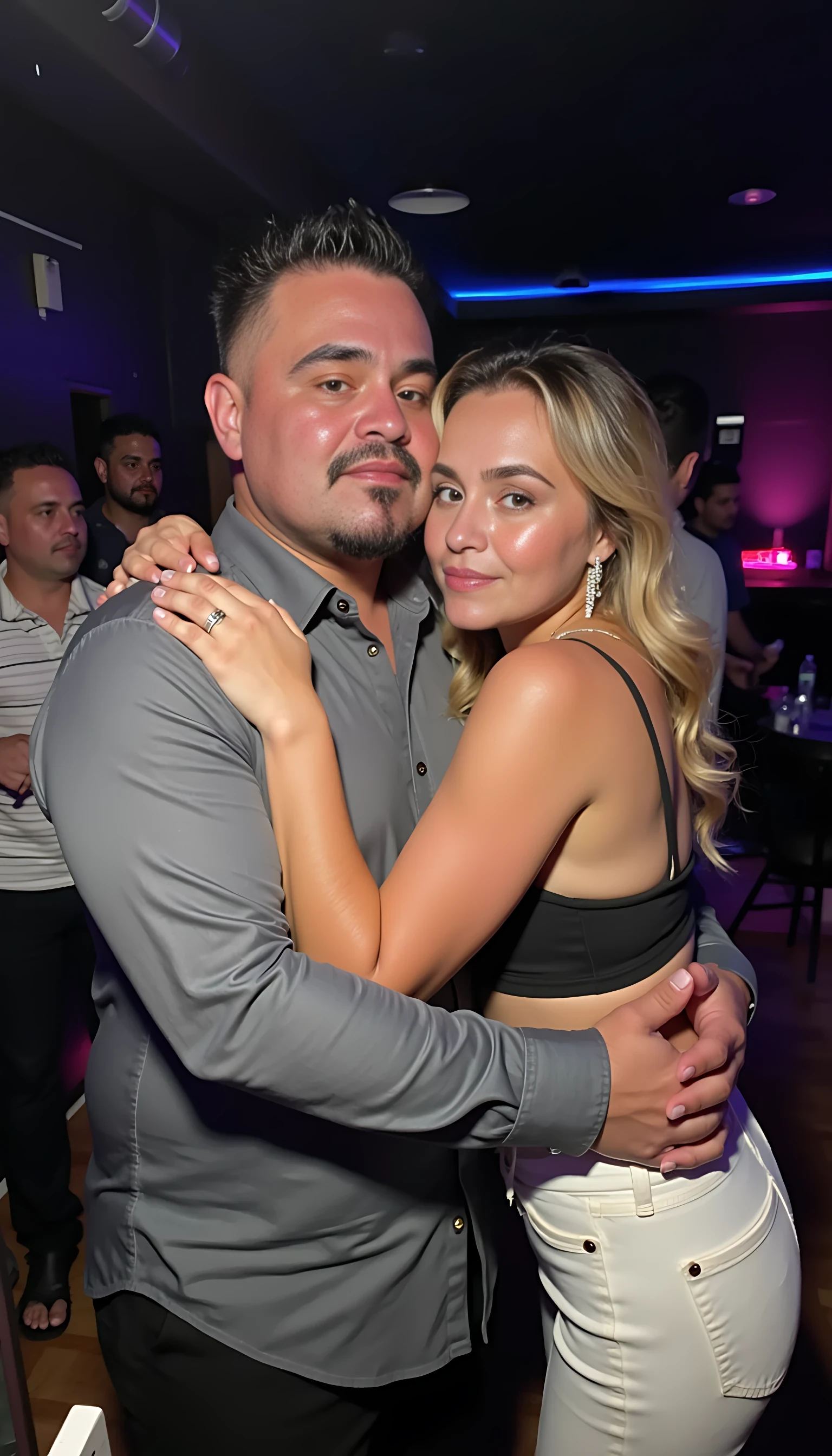 Selfie in a  mirror full man body wearing a  nice gray dress shirt   Hugging a beautiful blonde woman with blue eyes girl in a nightclub background 
