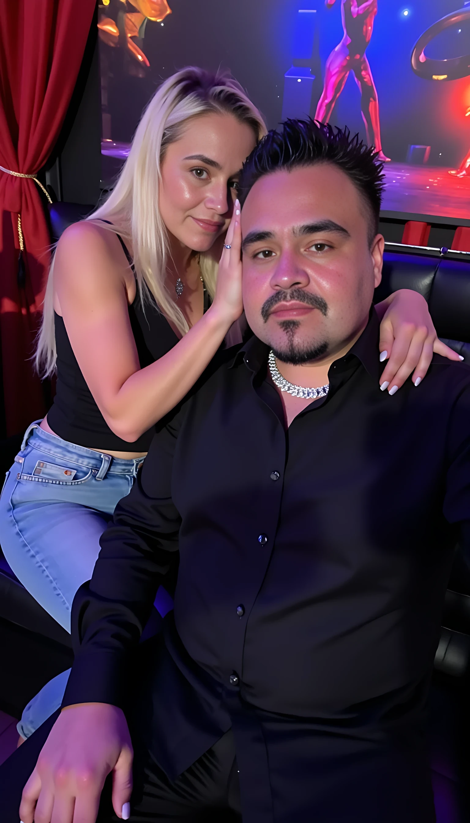 Man full average body  wearing a black Armani shirt and  a thick diamond chain seating on a king chair with a 2 beautiful blonde woman with blue eyes wearing sexy jeans seating on his lab with a night club background  highlight the blue eyes 