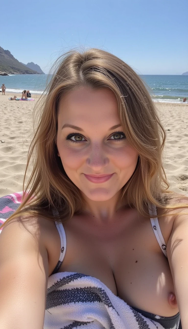 Photo of woman CSTMDL outside laying on a beach towel in the sand selfie