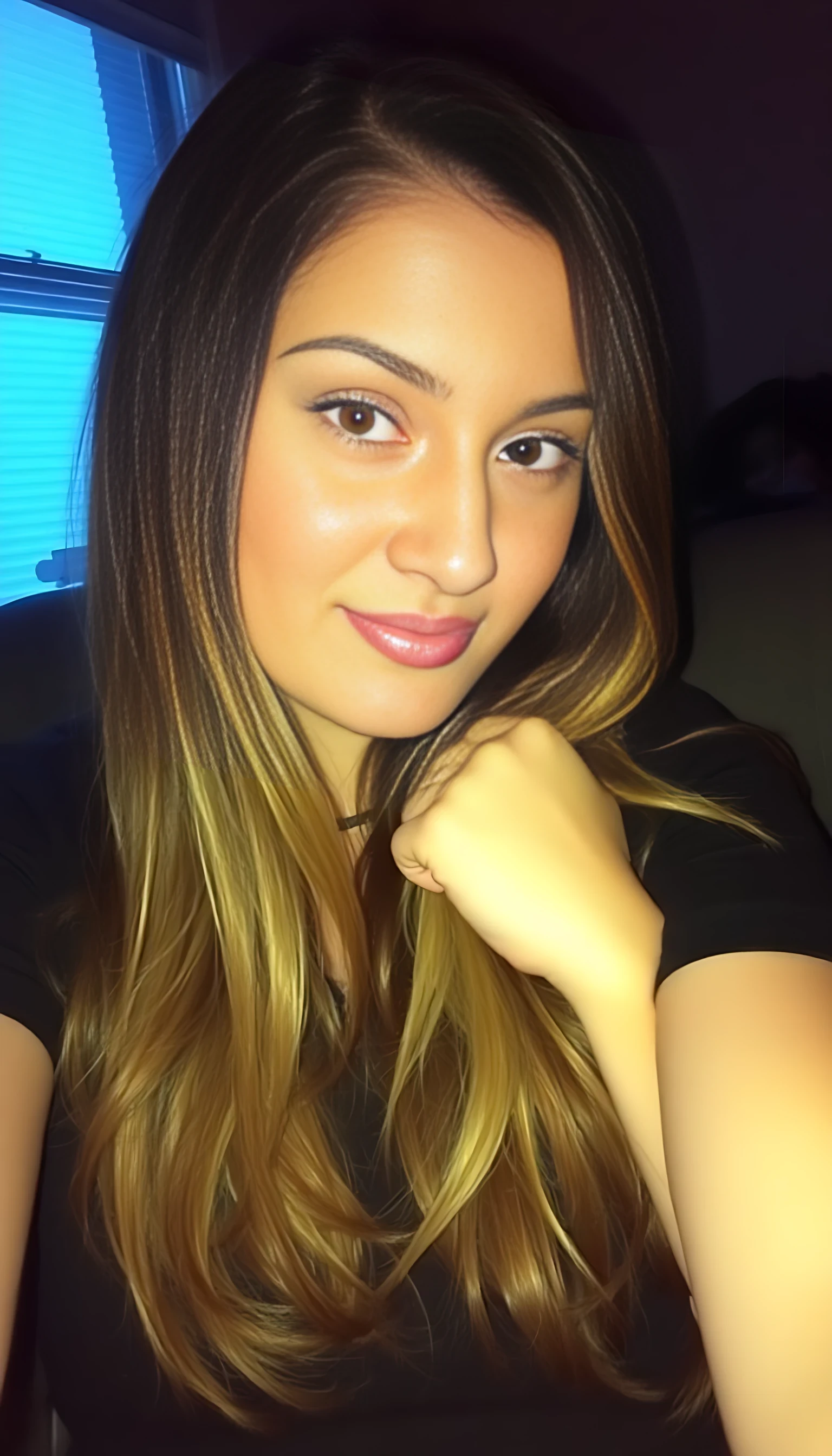 boring low quality snapchat photo circa 2015, cute woman, highlighted hairs, she is in stocking