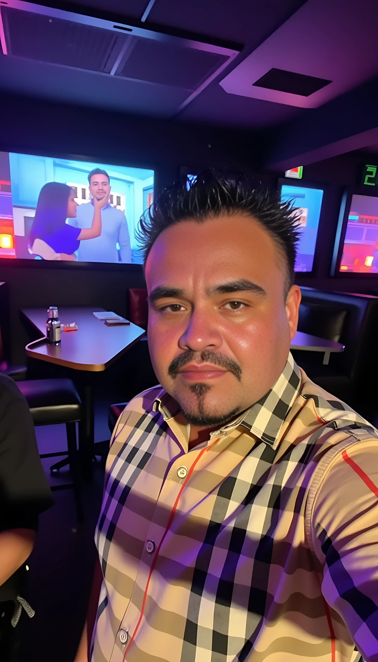 CSTMDL  selfie man average body wearing a Burberry shirt standing 
With nightclub background 
