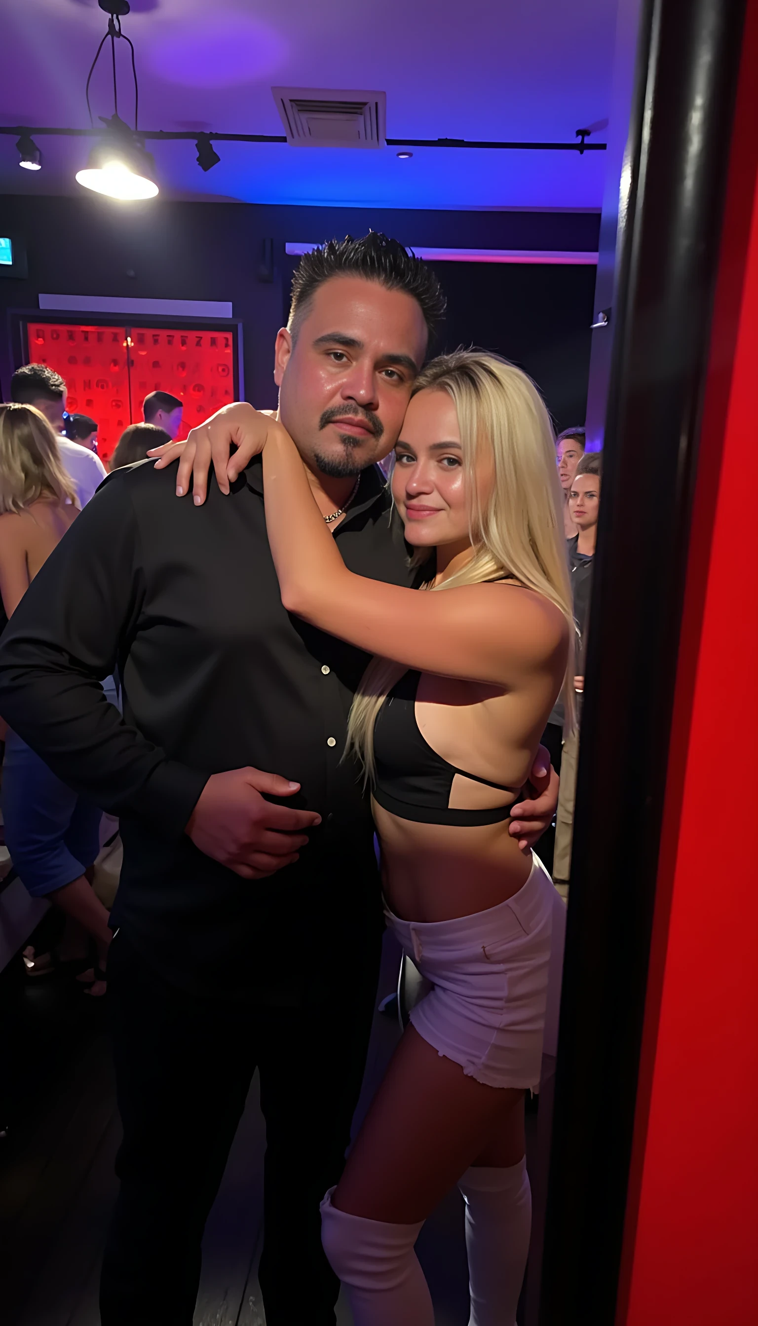 Selfie in a  mirror full man body wearing a  nice black dress shirt   Hugging with blonde girls in a nightclub background 
