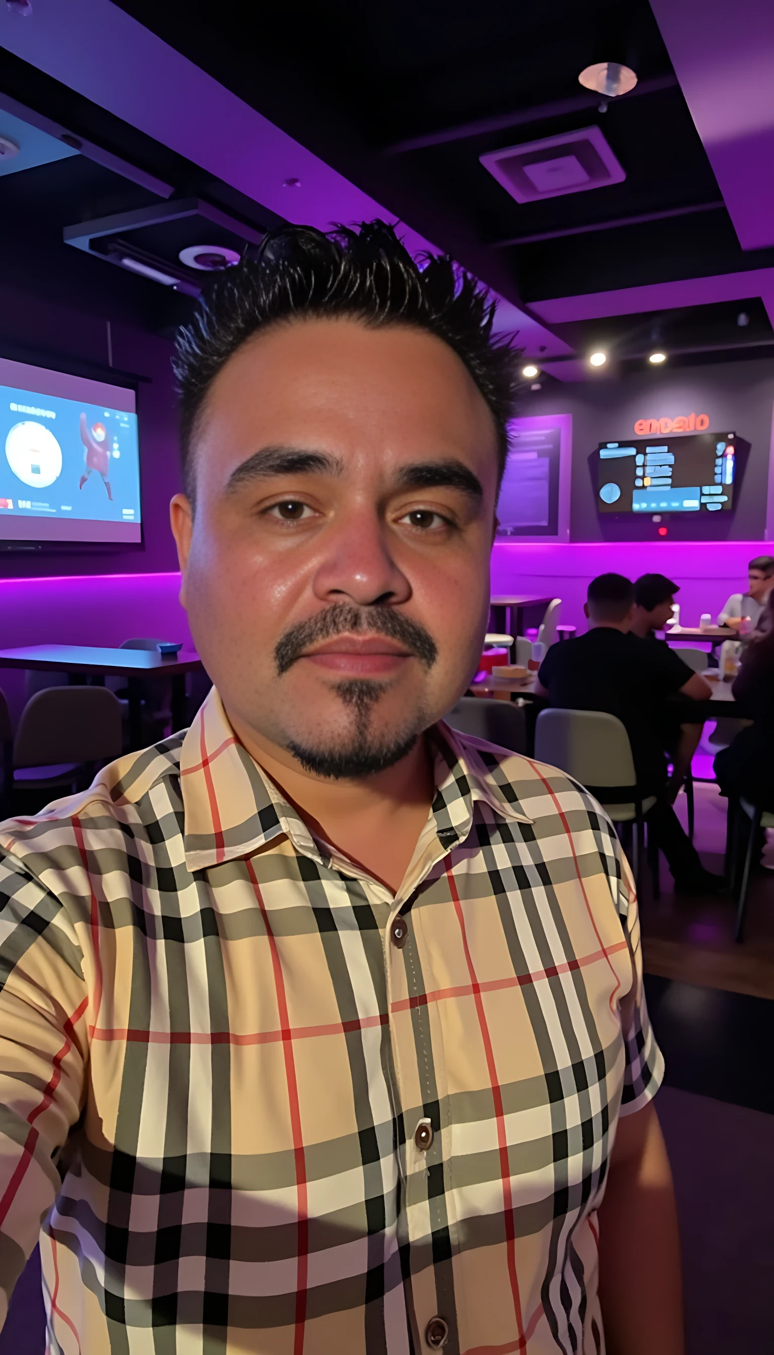 CSTMDL  selfie man average body wearing a Burberry shirt standing 
With nightclub background 