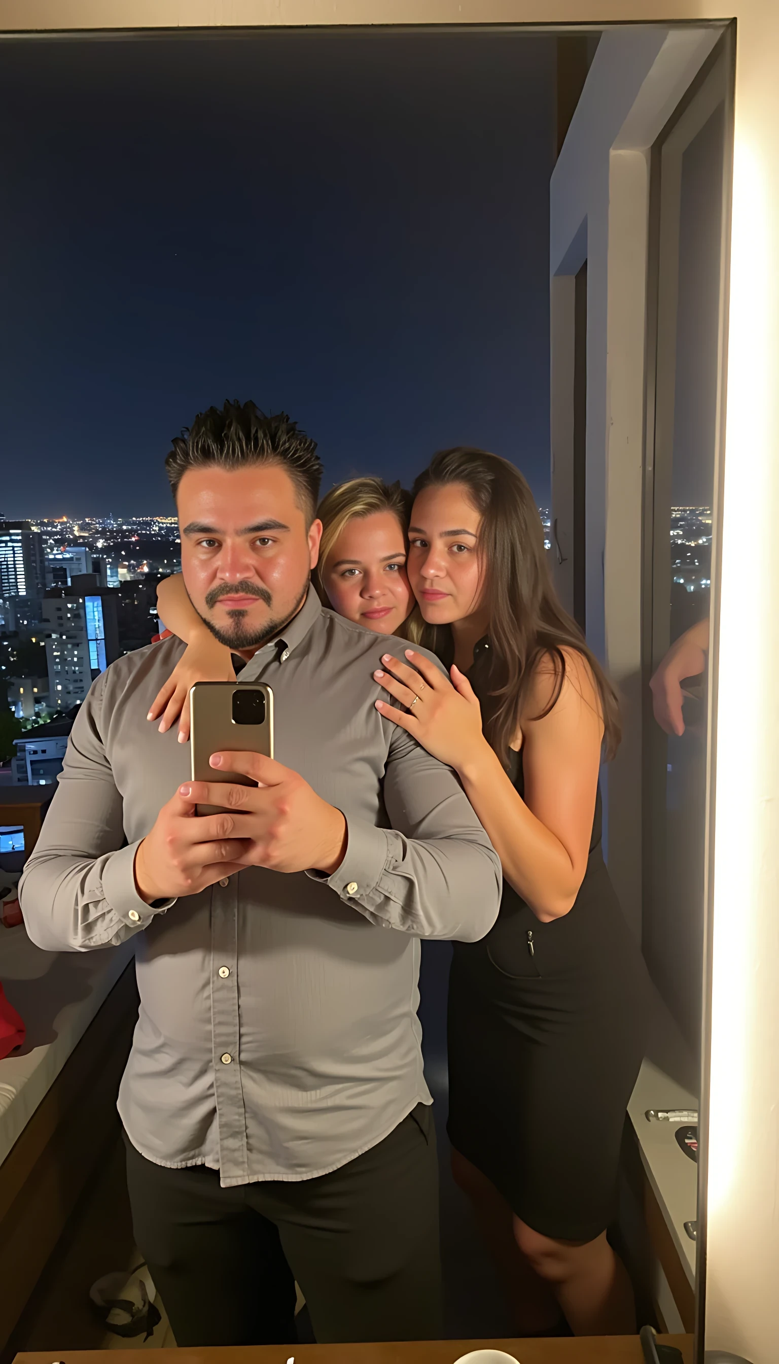 Selfie in a  mirror full man body wearing a  nice gray dress shirt   Hugging with 1 blonde girl with blue eyes and 1 Mexican girl in a  big city night lights background 
