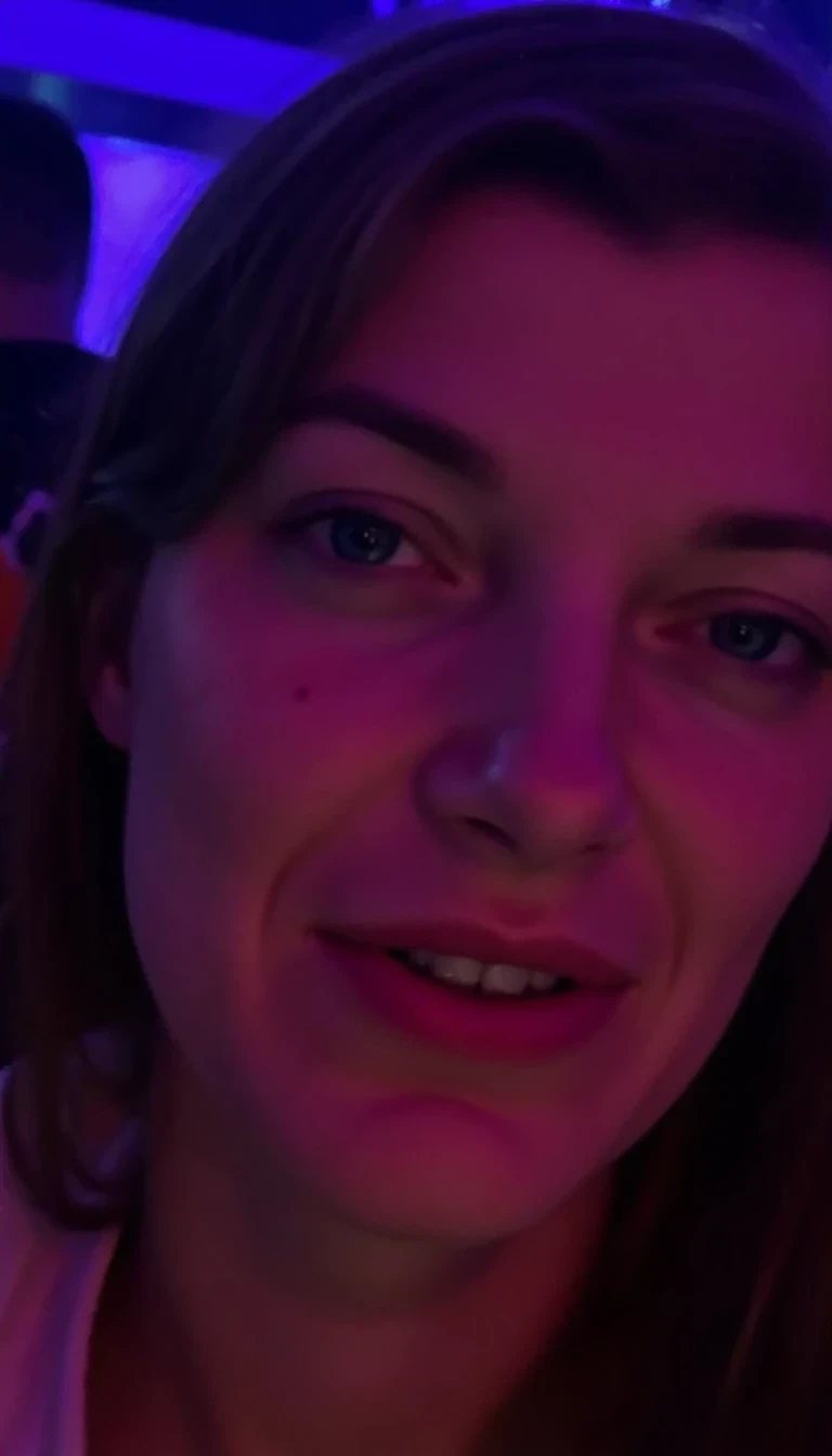 photo of sexy woman CSTMDL, boring low quality snapchat photo circa 2015, under blacklight, nude, at rave, full body