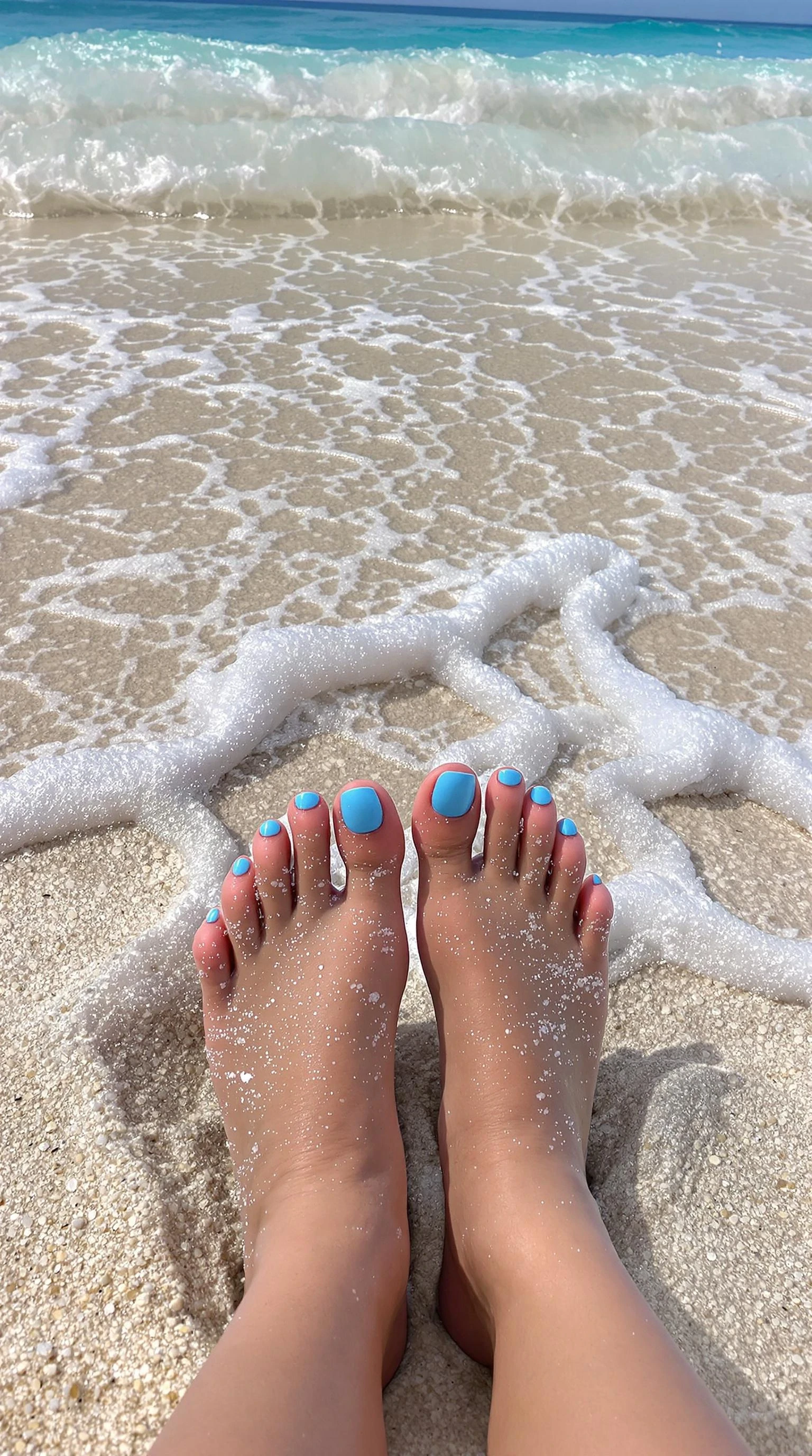 miami beach, realistic girl's feet with baby blue nails in sand with ocean's water