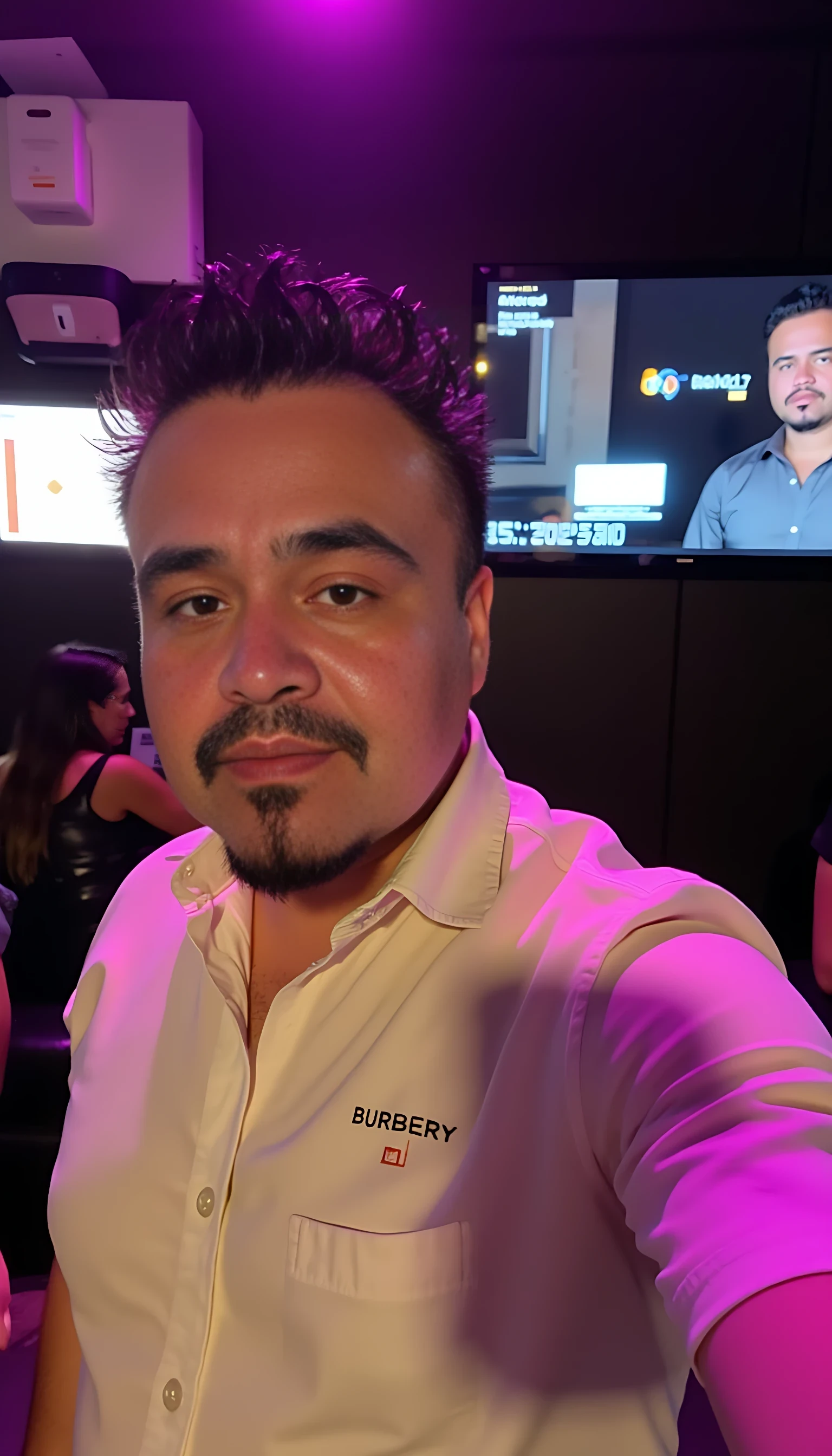 CSTMDL  selfie man average body wearing a Burberry shirt standing 
With nightclub background 