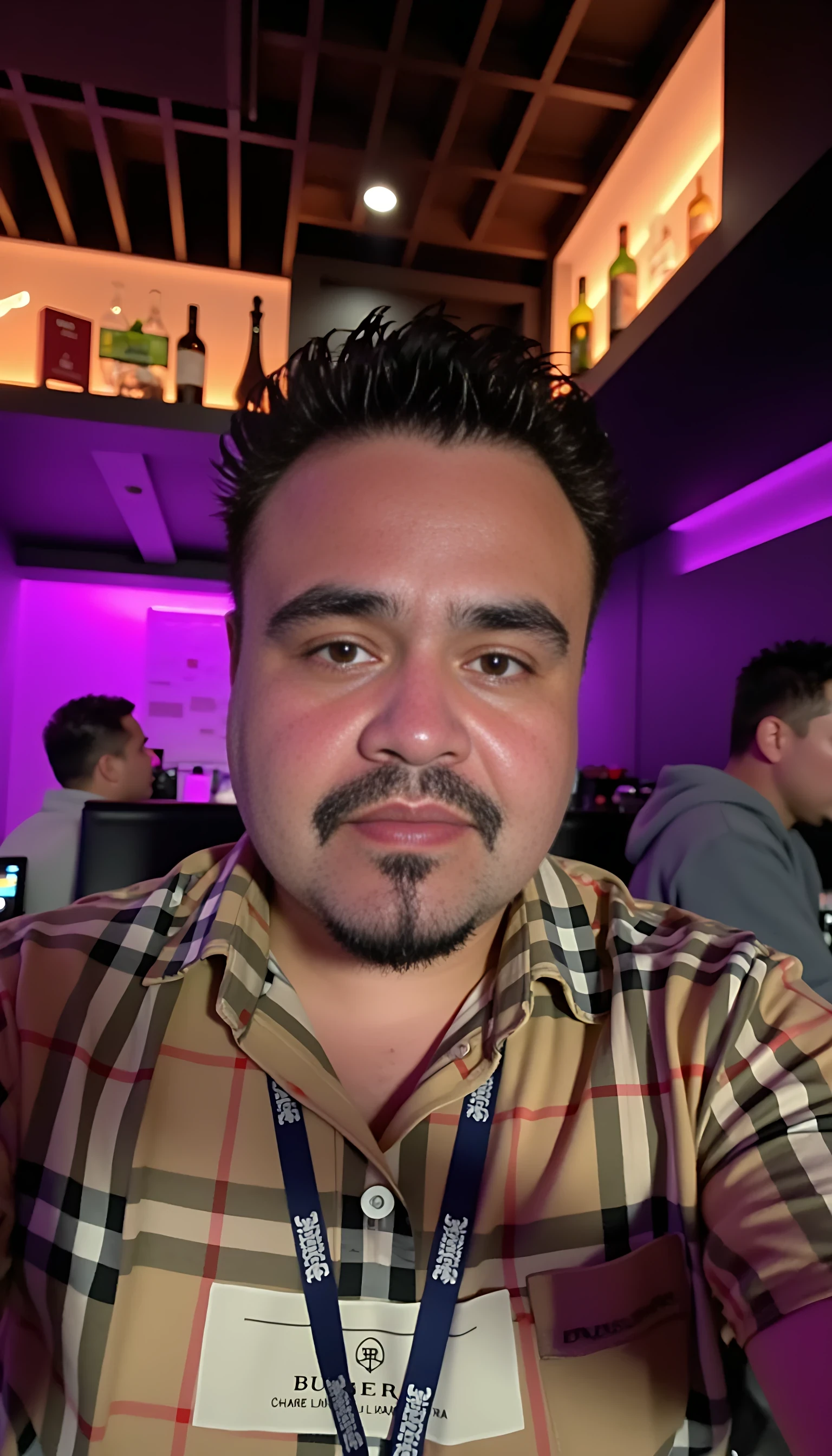 CSTMDL  selfie man average body wearing a Burberry shirt standing 
With nightclub background 