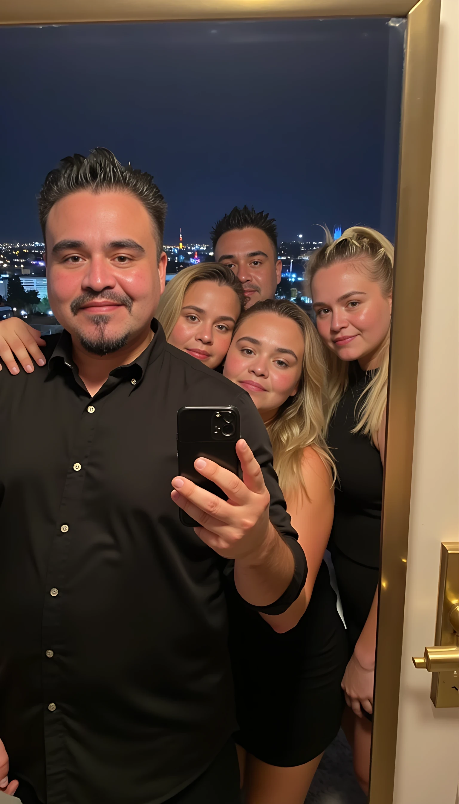 Selfie in a  mirror full man body wearing a  nice black dress shirt   Hugging with 5 blonde girls in a  big city night lights background 
