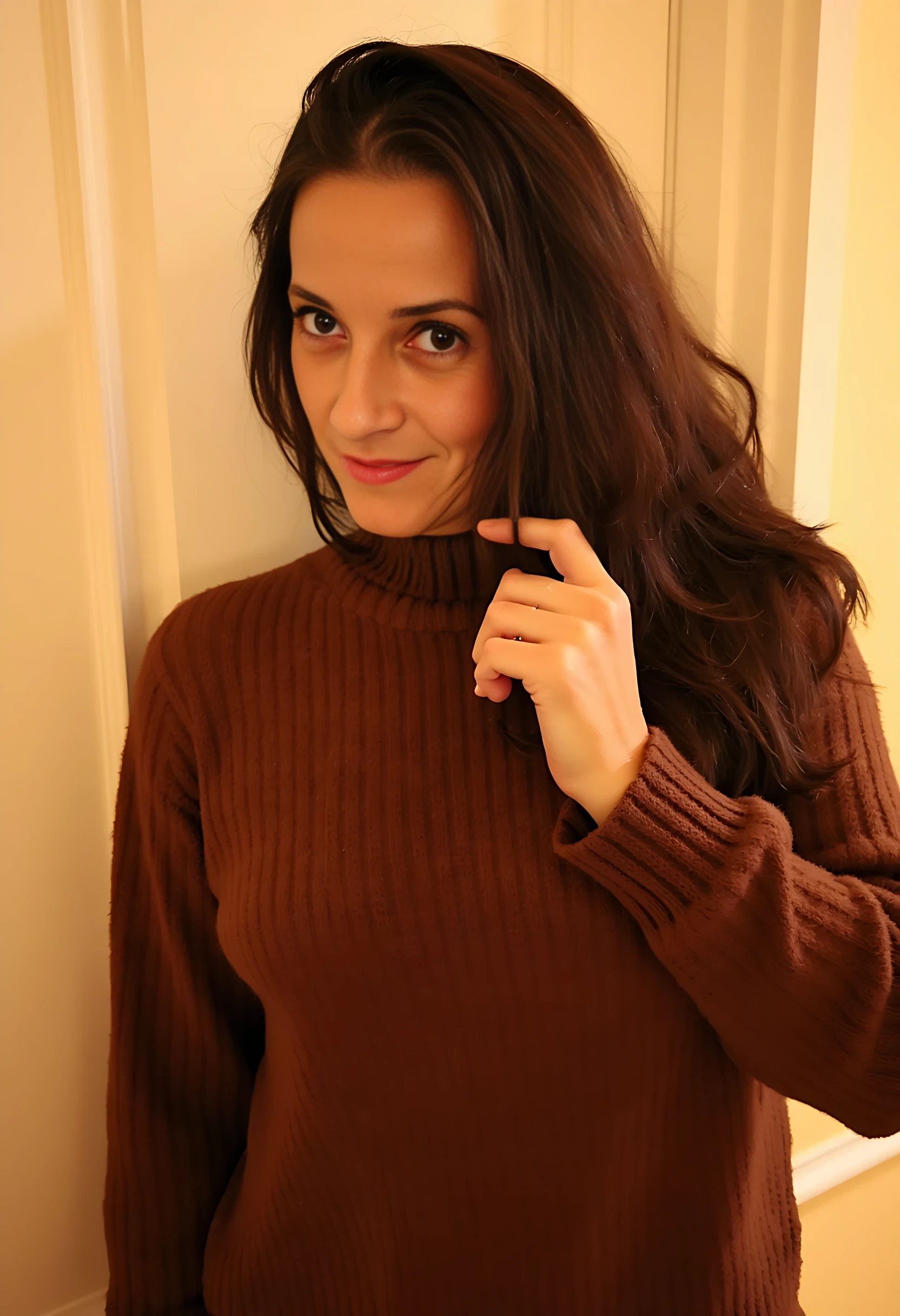photo of woman CSTMDL, A woman with wavy dark brown hair, wearing an off-shoulder oversized brown knit sweater. She gazes softly toward the camera, slightly tilting her head, with her right hand gently brushing her hair. The lighting is warm, creating a cozy atmosphere.
