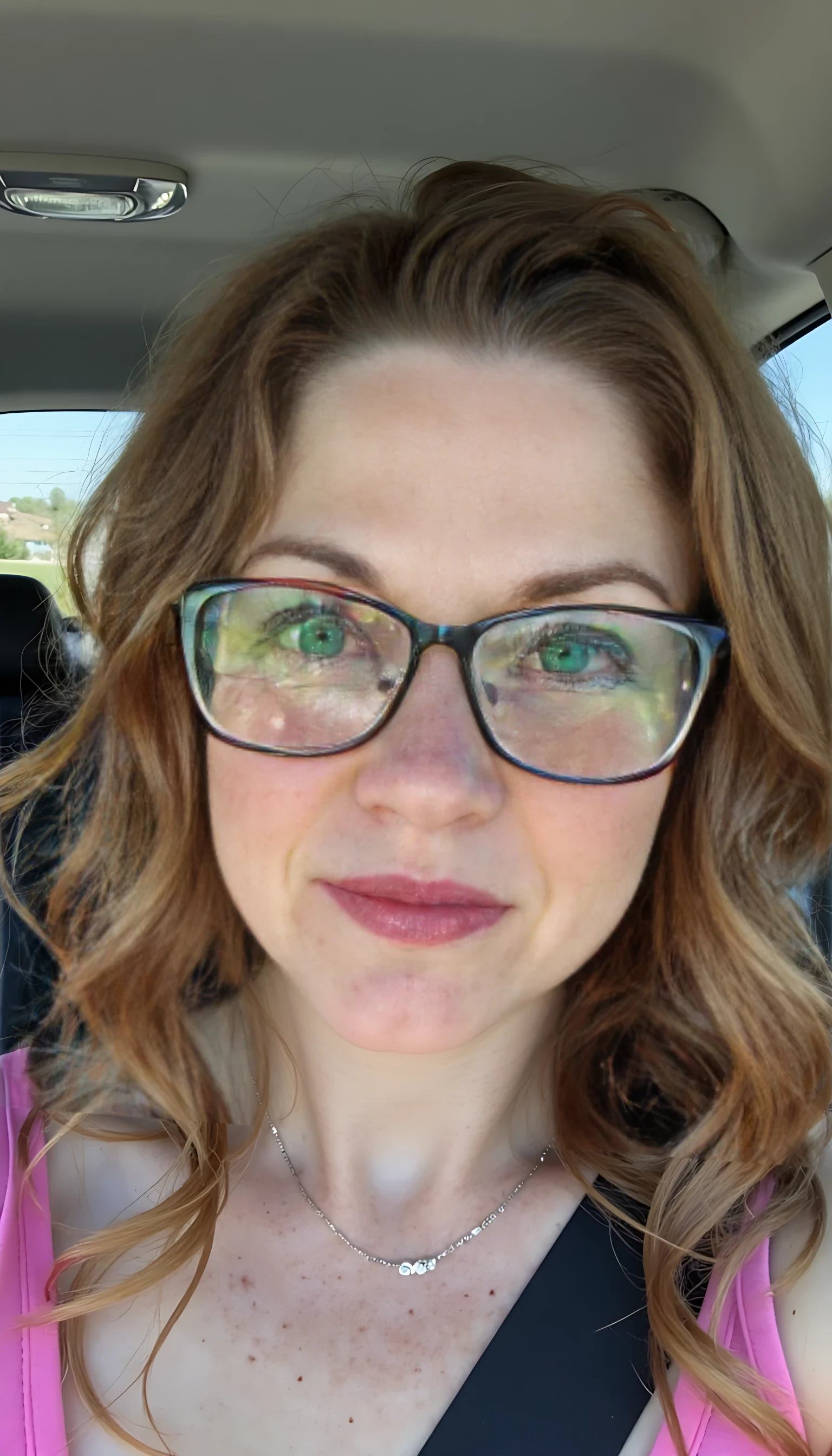 photo of cute woman CSTMDL in a car